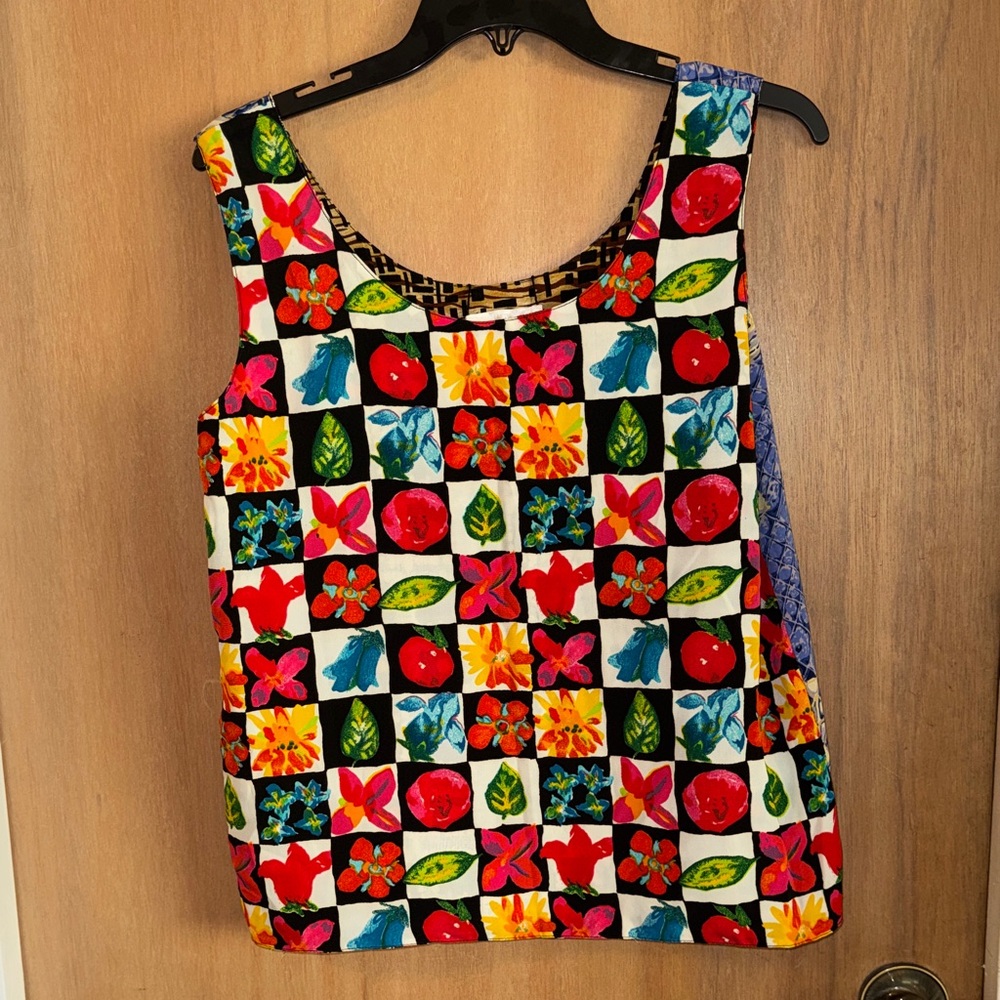 Vintage 80’s Jordan REVERSIBLE boxy tank top with FOUR
Colorful Patterns